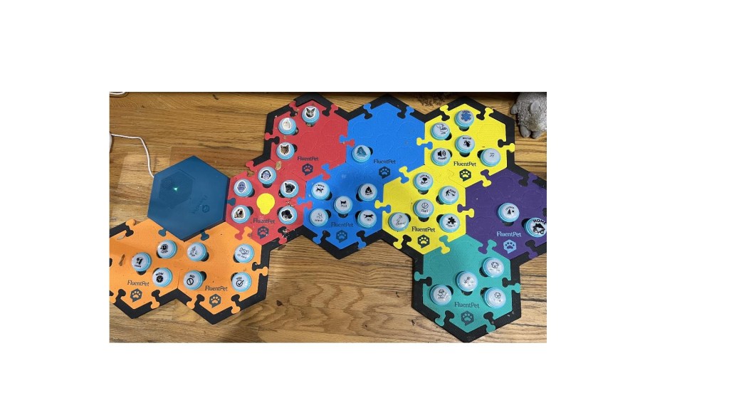 Another set of foam tiles with buttons containing pictures and words that tell what recorded word is spoken when the button is pressed. There are 37 buttons on this board.